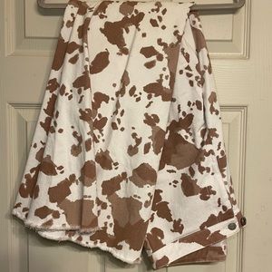 Altar’s State Ultra Flare Cow Print Pants